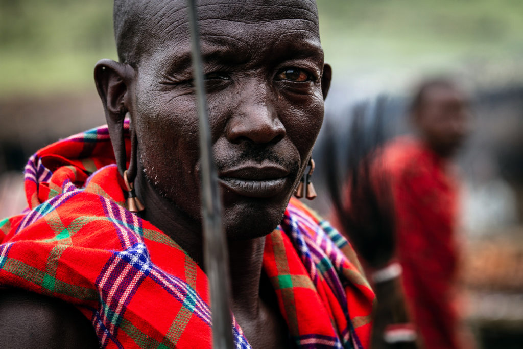 This is a Kenyan, Maasai warrior in traditional clothes. It is a Spring Equinox   image as it relates to the warrior archetype of the sign Aries.